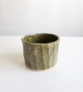 Ceramic cup in olive green